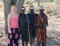 Eva with massai boys on the street
