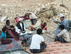 Eva visiting drovers of camels