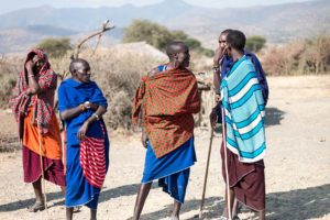 Masai walking dressing in bright colors