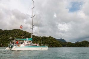 View of our catamaran between the cliffs