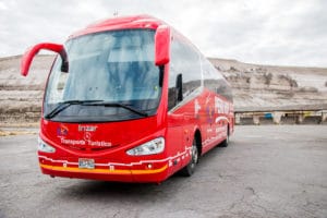 Typical red bus Peru Hop