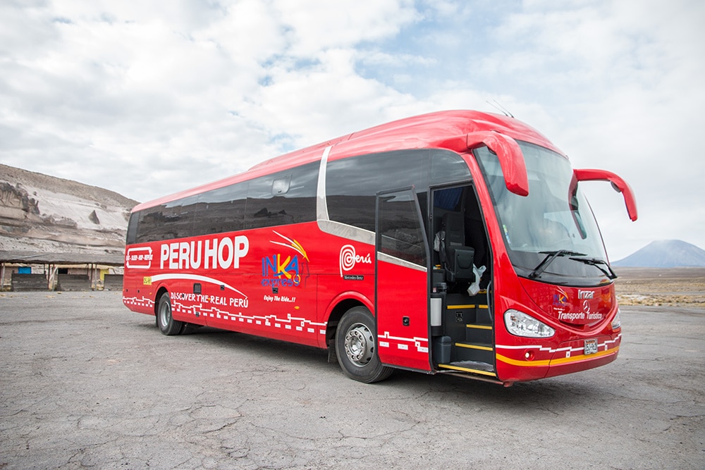 Typical red bus Peru Hop