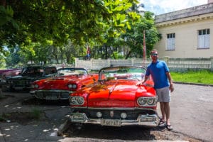 Tom in Cuba with car